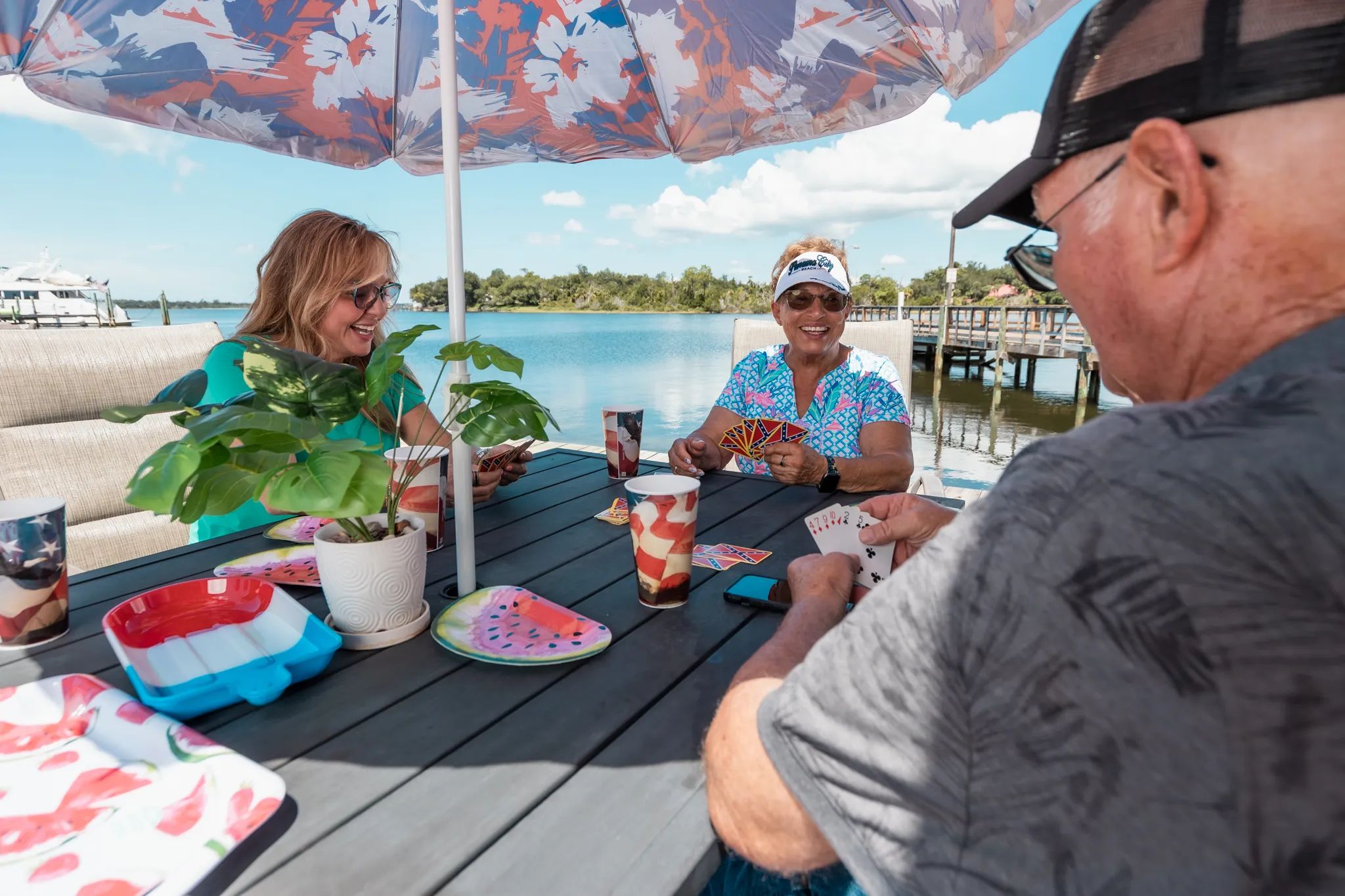 Guests playing cards together at Nautical Point RV Park